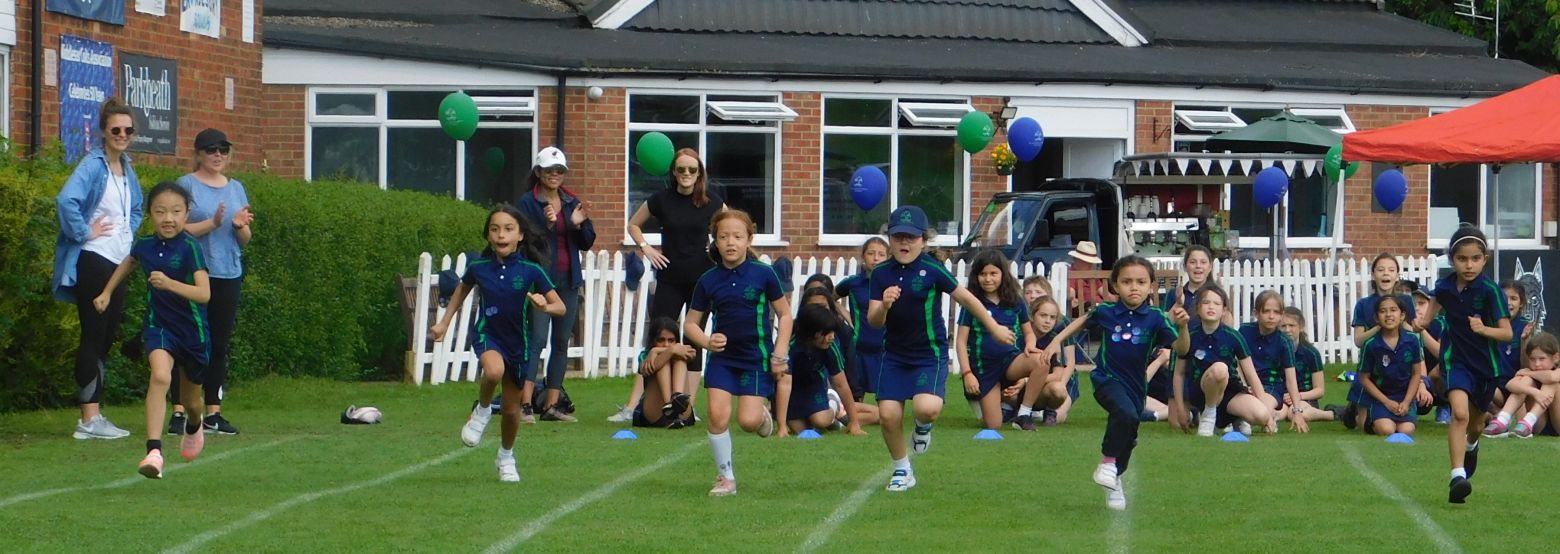 Girls competing on sports day